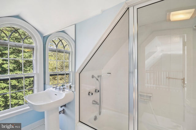 bathroom with lofted ceiling