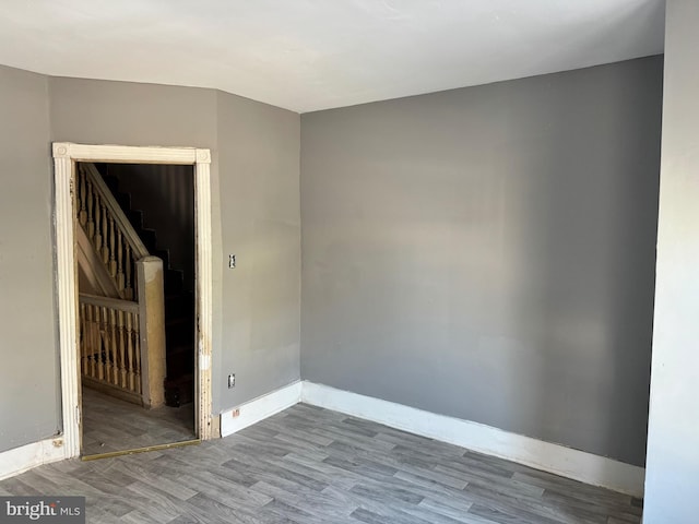 empty room featuring hardwood / wood-style flooring