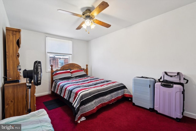 bedroom with dark carpet and ceiling fan