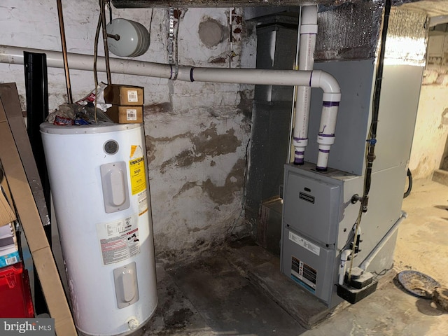 utility room featuring water heater and heating unit