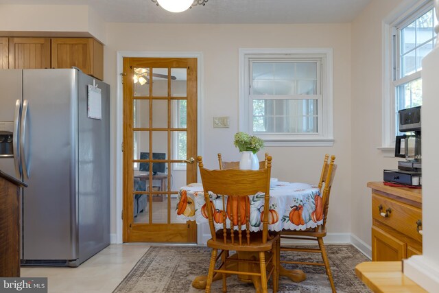 dining area with ceiling fan