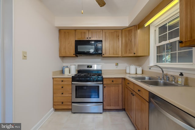 kitchen featuring stainless steel appliances and sink