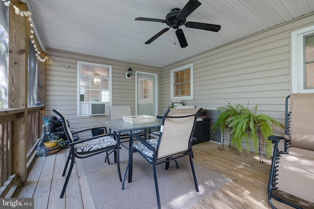 wooden terrace featuring cooling unit and ceiling fan