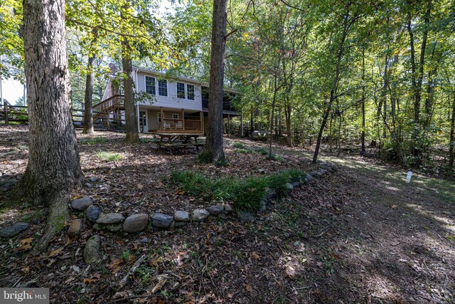 view of yard with a deck