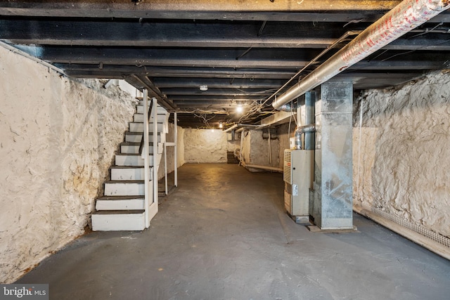 basement featuring heating unit