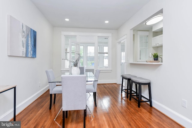 dining room with hardwood / wood-style floors