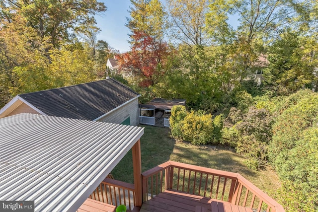 wooden deck with a yard