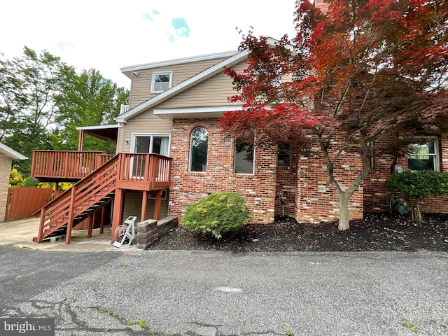 exterior space with a wooden deck