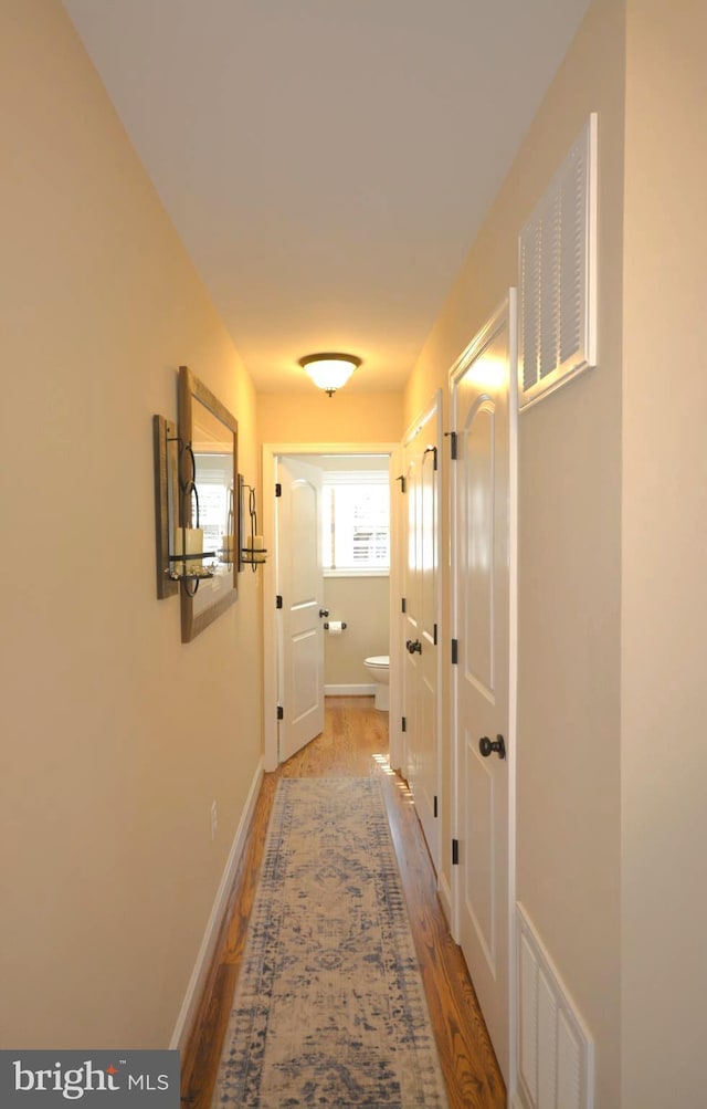 hall featuring hardwood / wood-style flooring