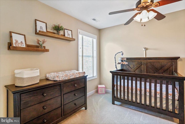 carpeted bedroom featuring ceiling fan