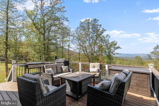 deck with an outdoor living space