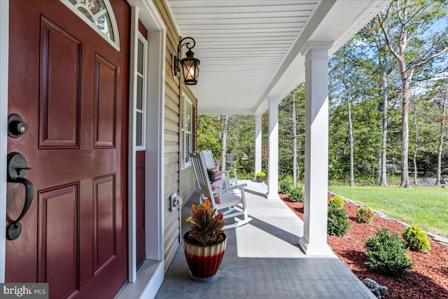 view of patio featuring a porch