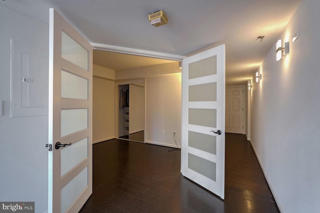 hallway featuring dark hardwood / wood-style floors