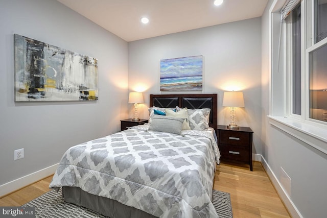 bedroom featuring light hardwood / wood-style floors