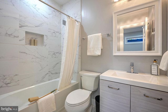 full bathroom with vanity, toilet, and shower / tub combo with curtain