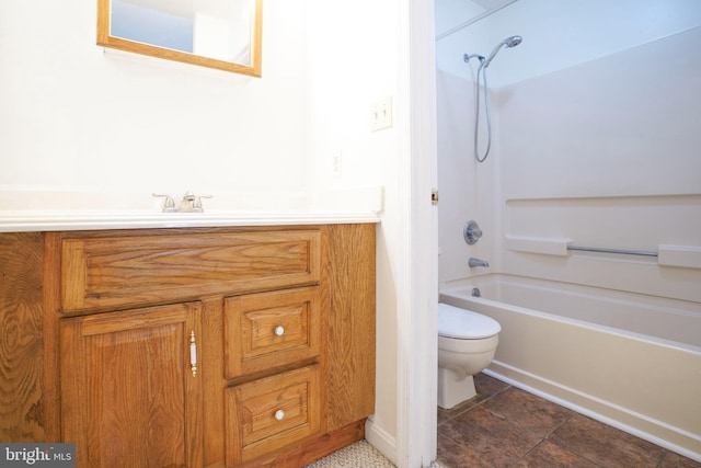 full bathroom with tub / shower combination, vanity, tile patterned flooring, and toilet