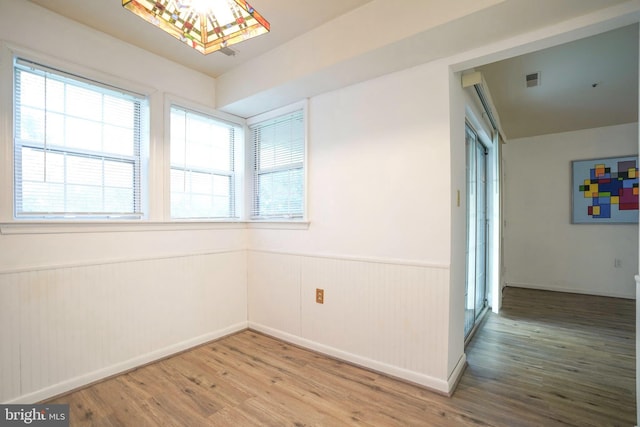 empty room featuring hardwood / wood-style floors