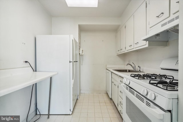 kitchen with white cabinetry, sink, and white appliances