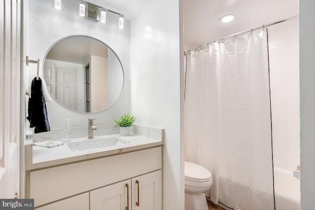 full bathroom featuring vanity, toilet, and shower / bathtub combination with curtain