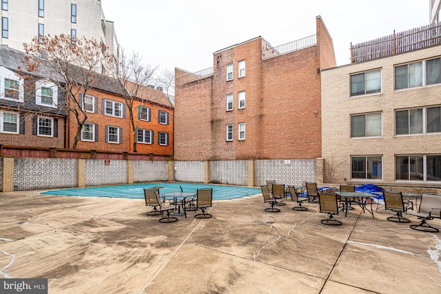 view of pool featuring a patio