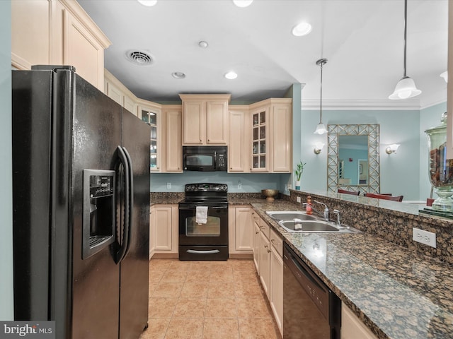 kitchen featuring light tile patterned floors, sink, ornamental molding, decorative light fixtures, and black appliances