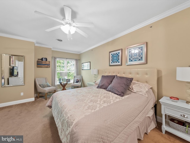 carpeted bedroom with crown molding and ceiling fan