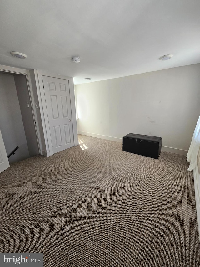 unfurnished bedroom featuring carpet flooring