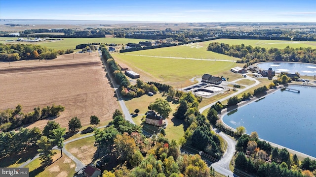 aerial view with a water view and a rural view