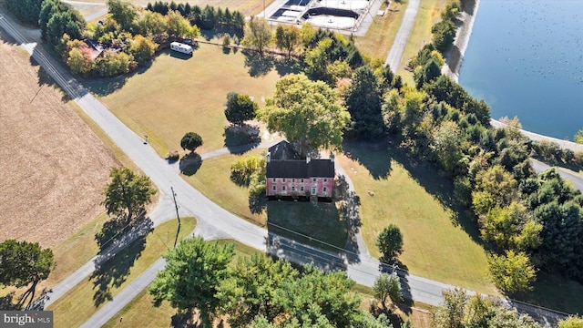 drone / aerial view with a water view