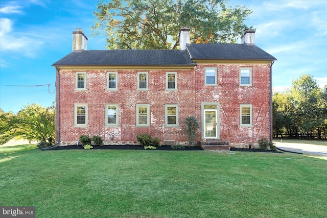 view of front of house with a front yard