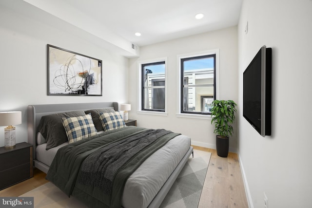 bedroom featuring light wood-type flooring