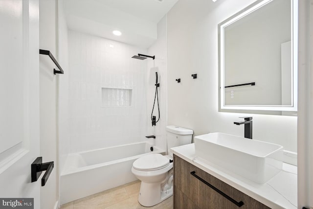 full bathroom with vanity, toilet, tile patterned floors, and tiled shower / bath