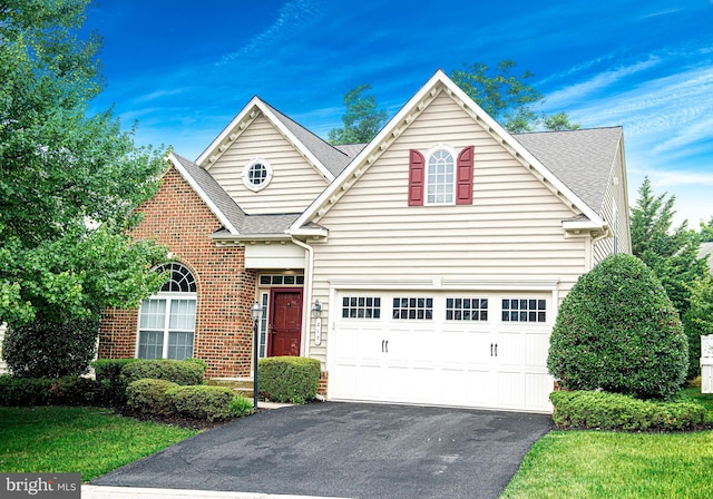 front of property with a garage