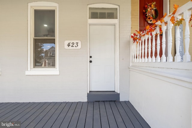 doorway to property featuring a deck