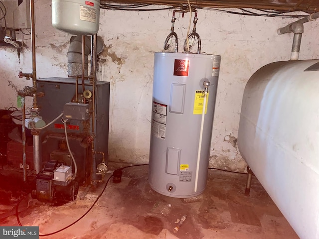 utility room featuring water heater