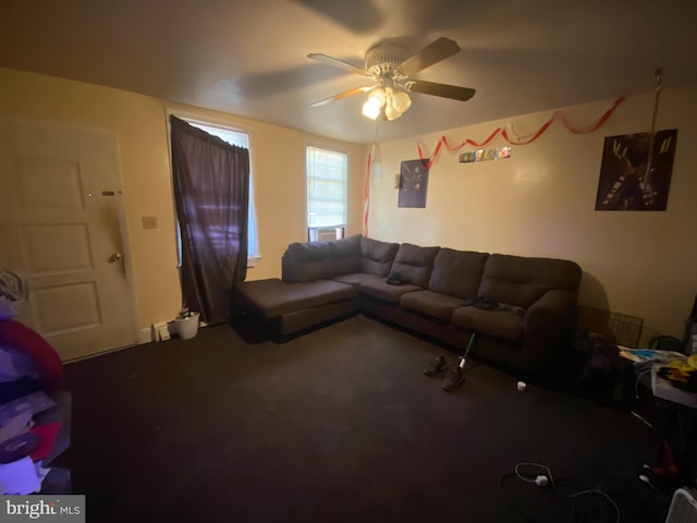 living room featuring carpet flooring and ceiling fan