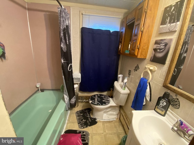 full bathroom featuring sink, shower / tub combo, and toilet