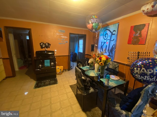 dining area featuring crown molding