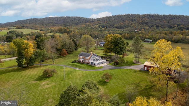 aerial view featuring a mountain view and a rural view