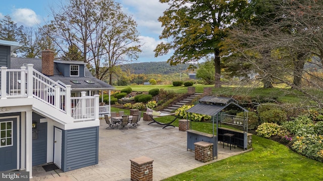 view of patio featuring a mountain view