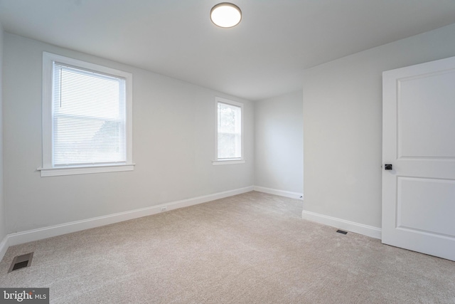 empty room with light carpet