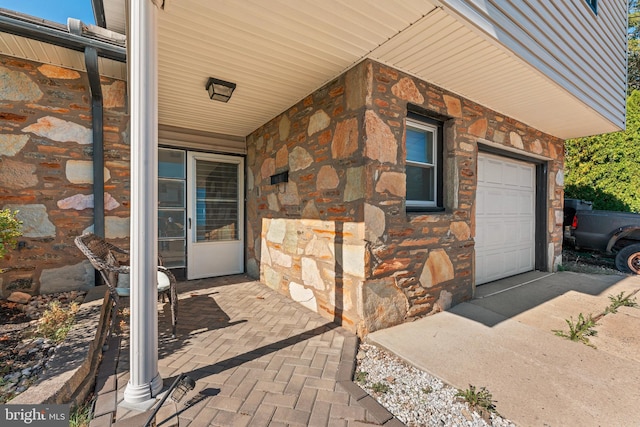 property entrance with a garage