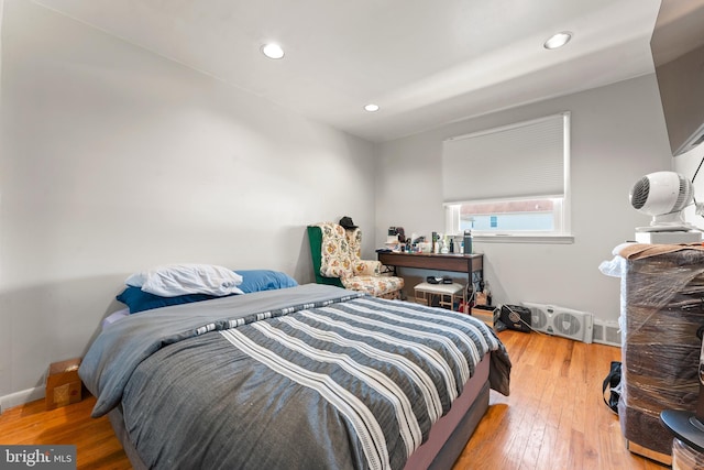 bedroom featuring hardwood / wood-style flooring