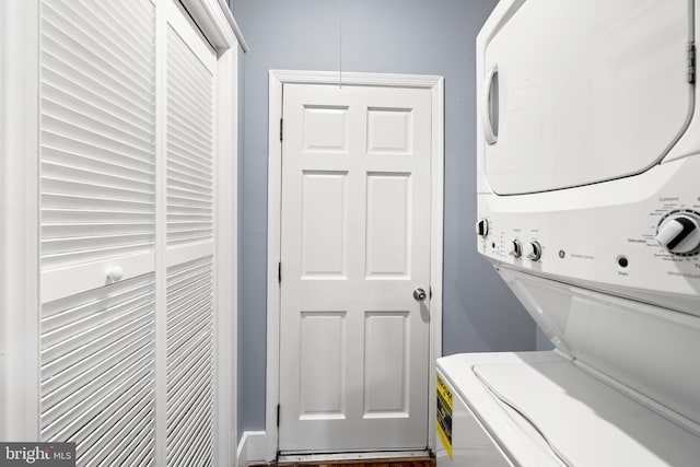 laundry room featuring stacked washing maching and dryer