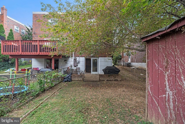 view of yard featuring a wooden deck