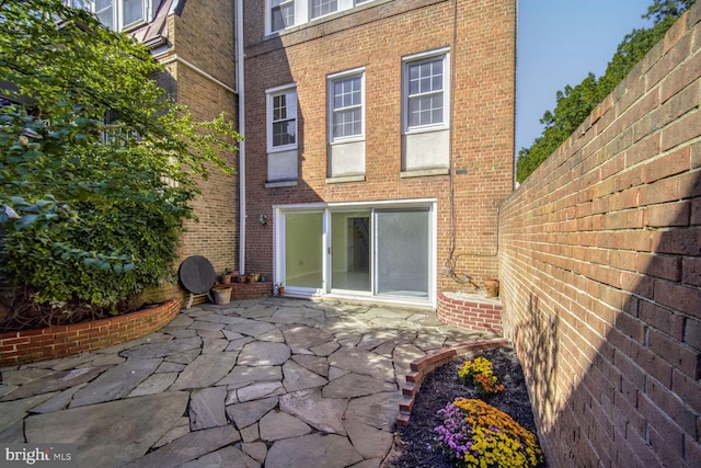 rear view of property with a patio area