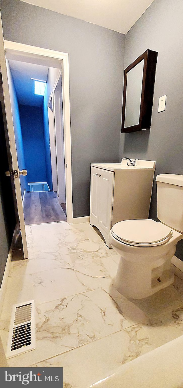 bathroom featuring toilet