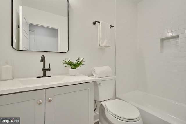 full bathroom with toilet, shower / bathing tub combination, and vanity