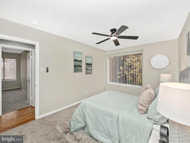 bedroom featuring ceiling fan and carpet floors