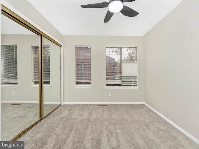 interior space featuring ceiling fan